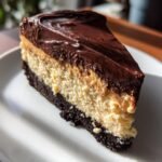 Peanut Butter Cheesecake with Oreo Crust and Chocolate Ganache
