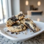 A close-up of Irresistible Cookies And Cream Cookies, showing the crumbly cookie dough with chunks of dark chocolate cookie pieces.