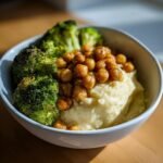 Close-up of a Vegan Chickpea Broccoli Mashed Potato Bowl featuring creamy mash, roasted broccoli, and seasoned chickpeas.
